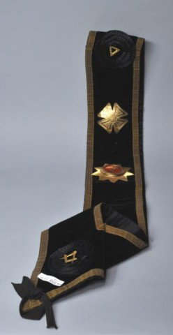 Masonic Velvet Sash: Masonic velvet sash with brass badges, Ames Sword Co., Chicopee, Mass. 36" long, 4 1/2" wide.