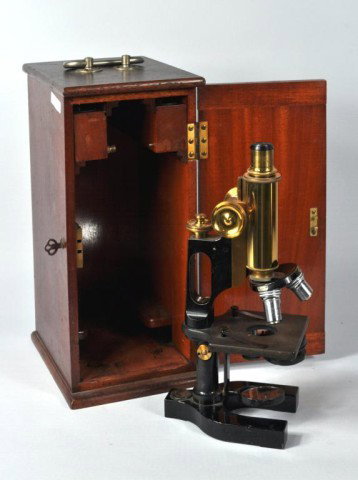 Bausch & Lomb Microscope, Wood Case, 1910s: Circa 1910s Bausch and Lomb microscope with original case and extra lenses/accessories in fitted compartments.