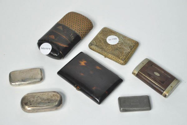 Group of 7 Snuff Type Boxes: Group of seven snuff type boxes; two with engraved detail, one with mahogany and silver mounts, together with two cigarette cases (one tortoiseshell) and a Japanese lacquer cigar case. 4 1/4" long, 3"