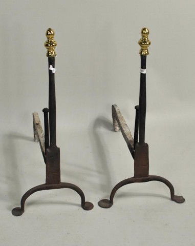 Pair of Iron and Brass Andirons, 18th C.: Fine pair of iron and brass andirons, of knife blade type, but with rounded bulbous shafts set on a rectangular plinth, with baluster turned brass finials. American 18th century. 22 1/2" high, 11" wid