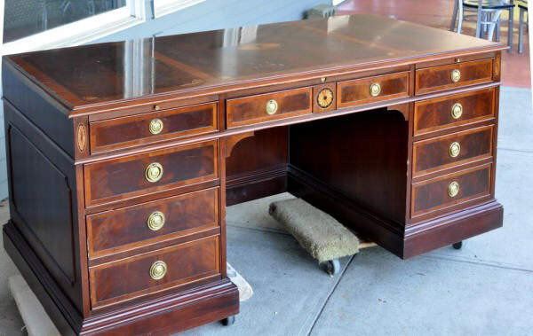 Inlaid Mahogany Executive Pedestal Desk: Chippendale style mahogany pedestal desk with fan inlays and cross-banding, scuffs and scrapes, some spots missing finish. 30 3/4" high, 72" wide, 36" deep.