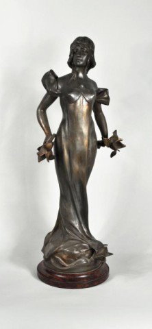 Anton K. Nelson (French, 1890-1910) Maiden: Anton K. Nelson (French, 1880-1910). Patinated bronzed spelter figure of standing French art nouveau maiden, late 19th/early 20th century, signed "Ant. Nelson" in cast, mounted on a grain painted wood