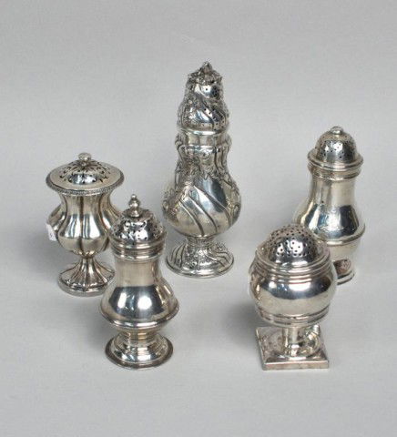 Five Silver Casters, Four English, One Continental: Four English silver casters, comprising: a George III example, possibly Abraham Barrier, London, 1789, of barrel form on pedestal form; a George II example by Joseph Smith I, London, 1751, of baluster