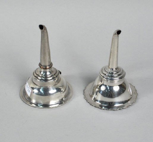 Two Sheffield Plated Wine Funnels, 1790, 1800: Two Sheffield plated wine funnels, circa 1790 and 1800, with detachable stems, the latter with gilt strainer bowl and stylized foliate border. Height: 5 3/8" and 5 1/8"