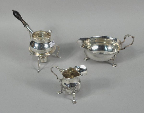 Three Silver Articles, Two London, One Dublin: Three silver articles, comprising a Victorian brandy warmer, Edwin Charles Purdie, London, 1894, with turned wood handle, on stand, lacking burner; a Victorian creamer, T. Hayes, Birmingham, 1898, dro