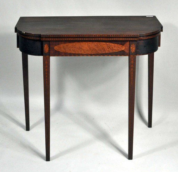 Hepplewhite Style Inlaid Mahogany Card Table: Fine hepplewhite style inlaid mahogany card table, with birdseye maple cartouche in apron, oval paterae inlays on the legs, above elaborate husk inlays. American, late 19th century. 29 1/4" high, 35" 