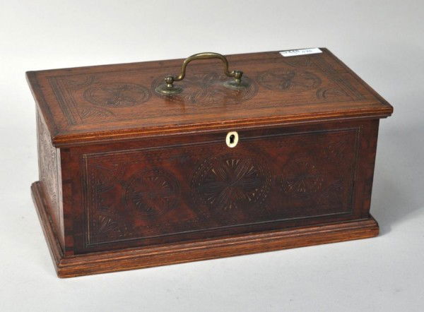 Rare Chip Carved Walnut Box, 18th C.: Rare chip carved walnut box with original brass bale handle. American, 18th century. 5 1/2" high, 12 1/2" wide, 6 1/2" deep.