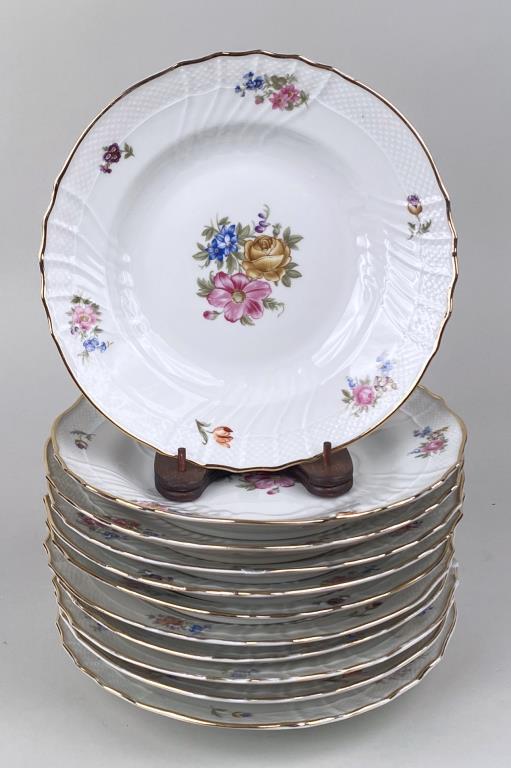 Assembled Set 11 Ginori Italian Porcelain Plates: shallow bowls with swirl and cross-hatch raised design and floral motif, gilt edges. Marked variously "Richard Ginori", 11719 and other numbers. 9 1/2" to 9 3/4" diameters. Some gilt wear/loss to a fe