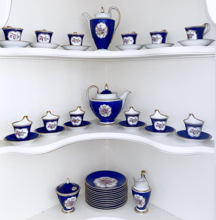 Furstenburg Porcelain Demitasse Set: comprising: 12 cups & saucers, 12 dessert plates, coffee pot (cocoa), teapot, creamer & sugar. Coffee pot: 7 1/2" high, 6 1/4" wide, 4 1/4" deep; tea: 6 1/4" high, 7 1/2" wide, 5 1/2" deep; saucers: 4