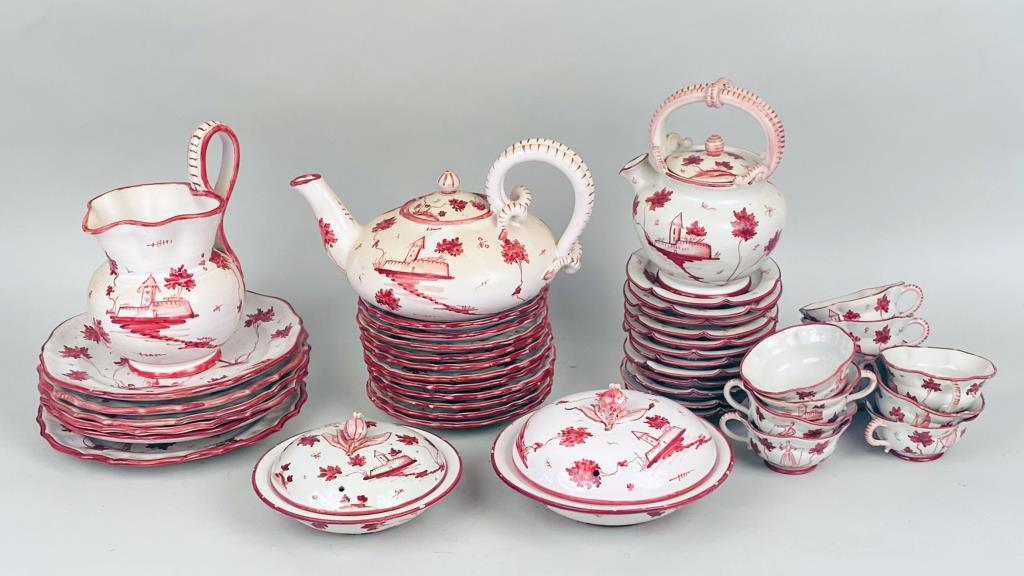 Cantagalli Red/White Majolica Partial Service: including teapot, creamer, water pot and covered dishes, earlier 20th century, together with 7 dinner plates, 11 dessert plates, 12 saucers, 11 cups. Largest: 6 1/2" high, 11" wide, 7 1/2" deep. Small