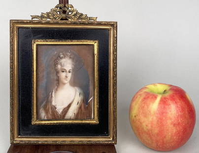 Carriera, Portrait Miniature, Royal Portrait: after Rosalba Carriera (1673-1757). Bust length portrait of a Royal lady, signed lower right in a gilt metal and ebonized LXVI style frame. Frame size: 6" high, 4 1/2" wide. Miniature: 3 1/4" high, 2
