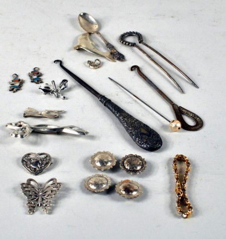 Group of Assorted Jewelry Items: Group of assorted jewelry items comprising 4 sterling pins, 4 sterling buttons, one gold overlay on sterling bracelet with stones, one Trifari costume pin, 2 button hooks, hat pin with pearl, hair com