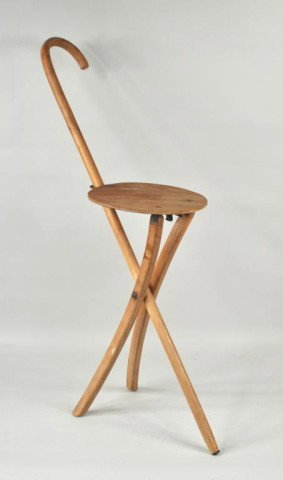 Stafford-Johnson Cane Form Folding Chair: Stafford-Johnson cane form folding chair, collapsing mechanism with round seat, bearing stencil "Stafford-Johnson Co. Ionia Michigan Pat Pending." 1930's. 30 1/4" high, 9" wide, 22" deep.