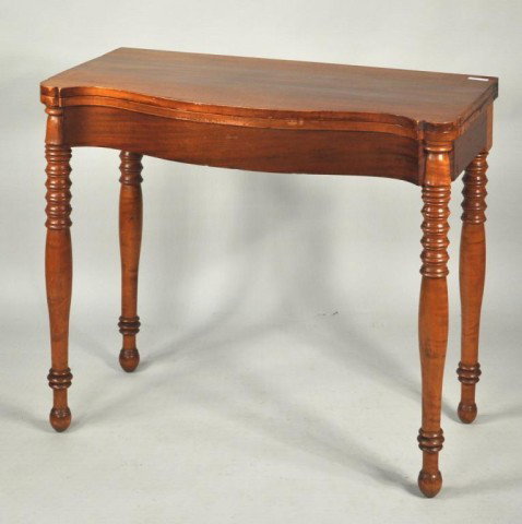 Country Sheraton Cherry Card Table, 19th C.: Country Sheraton carved cherrywood card table, with serpentine top and turned legs, with ball feet. 30" high, 36" wide, 17 1/2" deep; open: 30" high, 36" wide, 35" deep