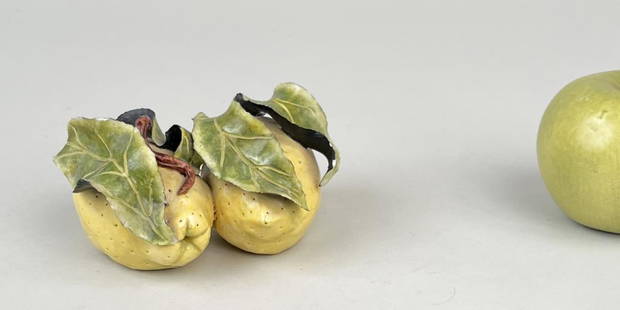 Katherine Houston Porcelain Lemons: signed on base. 2 5/8" high, 5" wide, 3 1/2" deep. Leaf chipping, small losses.