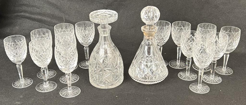Group Fourteen Waterford Avoca White Wine Glasses: together with a Waterford and an unsigned decanter. Largest decanter: 10 1/2" high, 5 1/4" diameter. Glasses: 6 1/2" high, 2 1/2" diameter. Large decanter with chipping to base of stopper, Waterford d