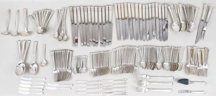 Large Tiffany Sterling Partial Flatware Service: in the Windham pattern; monogrammed "G". Comprising approximately 18 orange spoons, 18 tablespoons, 17 teaspoons, 16 butter spreaders, 12 iced tea spoons, 12 soup spoons, 11 dinner forks, 17 pastry fo