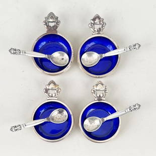 Group Four Georg Jensen Sterling Salts & Spoons: with cobalt blue enamel interiors; acorn pattern. 1/2" high, 2 3/8" wide, 1 5/8" deep. Gross weight: 3.565 OZT. Oxidation. *No credit card payments will be accepted for silver, gold, or jewelry from b