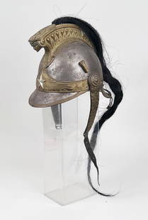 19th C. French Steel & Brass Military Helmet: cuirassier helmet with gilt brass comb having medusa head terminal, star badge and horsehair mane. Franck Auberville maker. 9" high, 8" wide, 11" deep. Oxidation.