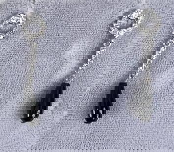 Pair White Gold, Diamond & Onyx Earrings: Art Deco style. 1 1/4" long. Gross weight: 1.5 DWT. *No credit card payments will be accepted for silver, gold, or jewelry from buyers that have not purchased from our gallery in the past.
