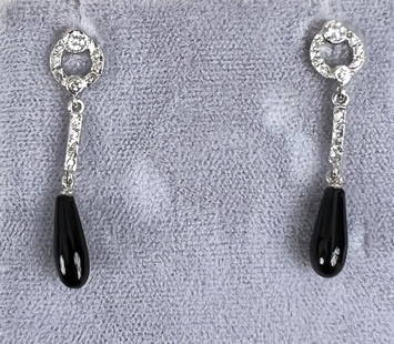 Pair White Gold, Diamond & Onyx Earrings: Art Deco style. 1 1/4" long. Gross weight: 1.5 DWT. *No credit card payments will be accepted for silver, gold, or jewelry from buyers that have not purchased from our gallery in the past.