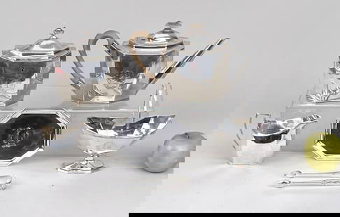 English Sterling Five Piece Tea Set: marked for London, William Fountain maker, with armorial crests and personalized 1922 on bottom of base. Comprising teapot, creamer, sugar bowl with strap handle, a footed stand, and a tea box (tea ca