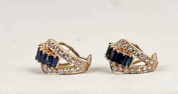 Pair Danker 14K Sapphire Earrings: 7/8" high, 1/2" wide. Gross weight: 6.4 DWT. *No credit card payments will be accepted for silver, gold, or jewelry from buyers that have not purchased from our gallery in the past.