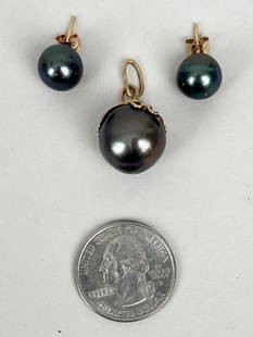 Tahitian Black Iridescent Baroque Pearl Pendant: gold mounted, measures 15mm, en suite with a pair of black iridescent Tahitian cultured pearl ear studs measuring 10.5mm. *No credit card payments will be accepted for silver, gold, or jewelry from bu