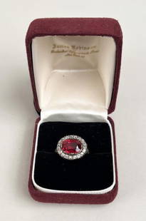George III Spinel, Rose Diamond & Gold Ring: with fine clarity, cabochon cut medium dark red spinel within surround of rose diamonds in engraved gold mount c. 1790. Oblong shape, largest diameter 13/16". Center stone and surround 1 3/4" wide. Gr