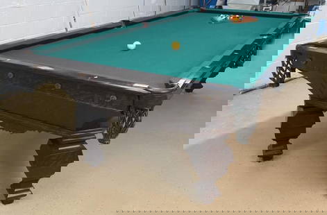 Brunswick Balke Callender Oak Pool Table: **This item is being offered from the premises of the consignor and is subject to special pickup arrangements. Please see below. The table is offered together with various accessories as shown in the