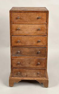 Small Country Pine Chippendale Chest: with exposed dovetailed top, bracket base, chestnut secondary wood. 35 1/2" high, 17 1/2" wide, 12 1/2" deep. Wear and scratches.