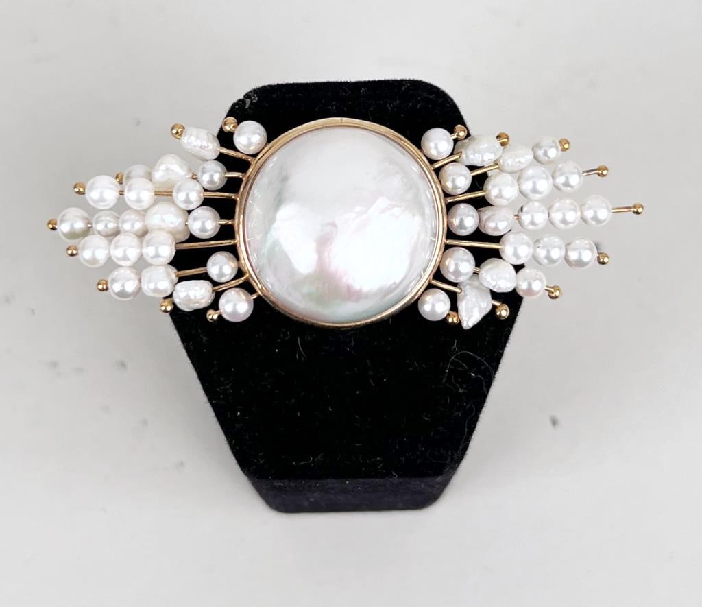14K Gold & Mabe Pearl Pin: brooch with ray type spray with baroque pearls. 7/8" high, 2 5/8" wide. Gross weight: 7.8 DWT. *No credit card payments will be accepted for silver, gold, or jewelry from buyers that have not purchase