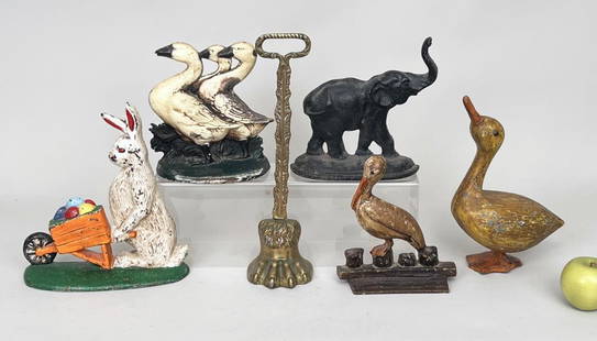 Group Cast Iron Door Stops: comprising animals and other, including Hubley. Largest: 15" high, 4" wide, 3" deep. Oxidation and use wear.