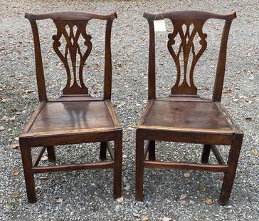 Pair English Elm Chippendale Side Chairs: with solid plank seats. 37" high, 19" wide, 16" deep. Age and use wear, loose crest on one, repairs and losses, one missing side seat frame board.