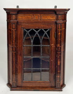 Diminutive Georgian Inlaid Oak Hanging Cupboard: the case with inlaid panels and single leaded glass door, stamped "J.E.B. 1894" to top. 26" high, 22" wide, 13 1/2" deep.