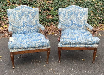 Pair French Provincial Fruitwood Fauteuils: with ram horn sculpted arms, turned legs. 38" high, 28" wide, 24" deep, 18" seat height. Wear to upholstery, scuffs and scrapes to wood surfaces with old repairs to hand rests on both arms of one chai