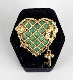 18K Tiffany & Co. Gold Heart Locket Brooch: with green enamel suspended with ornamental key. 1 1/8" high, 1 1/8" wide. Gross weight: 18 DWT. *No credit card payments will be accepted for silver, gold, or jewelry from buyers that have not purcha