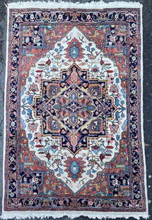 Persian Heriz Carpet: 20th century, 5' 10" wide, 9' 2" long. Reseller's tag verso. All rugs sold as is.