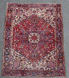 Persian Heriz Carpet: circa 1940's. 9' 9" wide, 12' 10" long. Some areas of wear, fading, please see photos. All rugs sold as is.