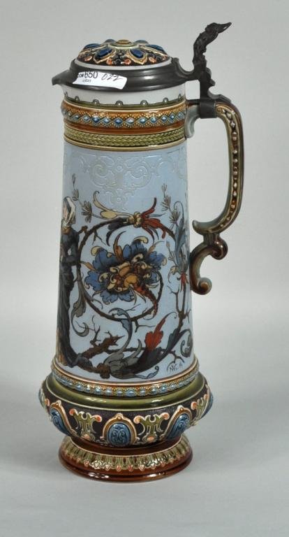 Mettlach #1734 Stoneware & Pewter Mounted Stein: Mettlach #1734 etched stoneware and pewter mounted stein, with medieval scene signed "Christian Worth", the underside with impressed abbey mark and mercury stamp (worn), date mark for 1895. 14 3/4" hi