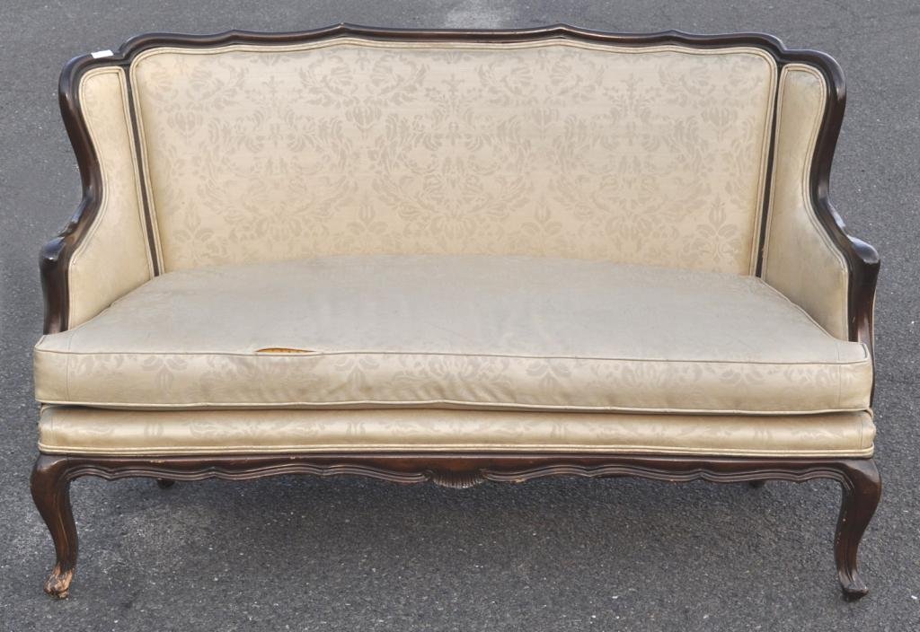Petite Louis XV Style Carved Walnut Settee: Petite Louis XV style carved walnut settee, with shaped back and arms on molded cabriole legs. 33 1/4" high, 54" wide, 27" deep.