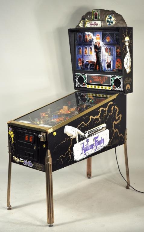 Bally "Addams Family" Special Edition Pinball Game: Bally "Addams Family" special collector's edition pinball game machine, 1994, with gold accents and plaque fixed to front lower right of case, numbered 852. 83" high, 29" wide, 55" deep.