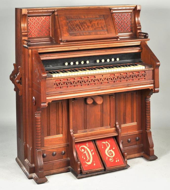 Kimball-Chicago Victorian Walnut Pump Organ: Vintage Kimball-Chicago Victorian carved walnut pump organ. 51 3/4" high, 49 1/4" wide, 23 3/4" deep.