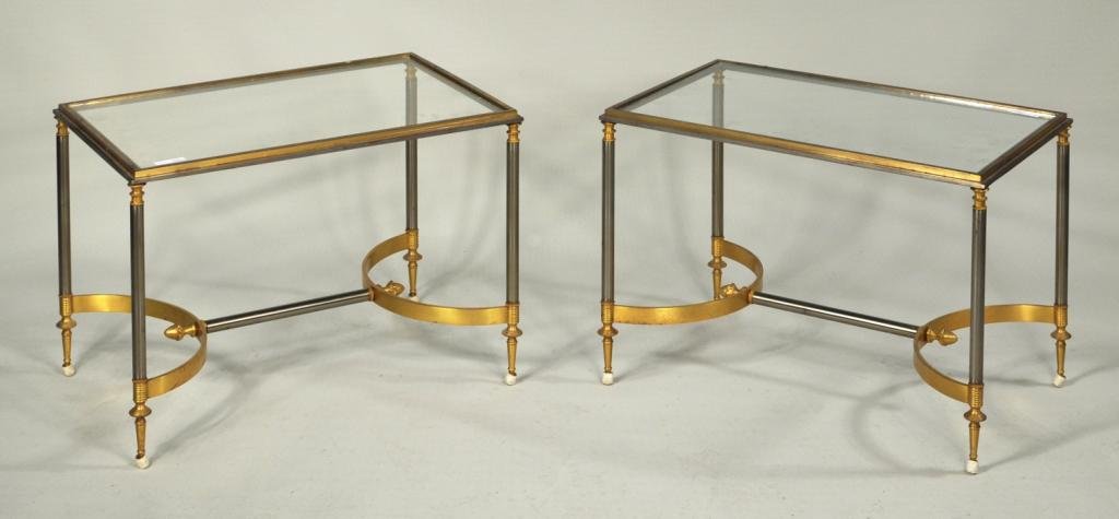 Pair of Brass, Chrome & Glass End Tables: Pair of brass, chrome and glass end tables in the neoclassical taste. Each 16 1/2" high, 24" wide, 15" deep.