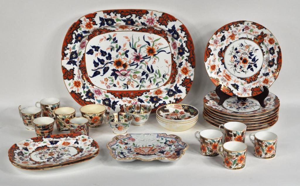 Group of 28 Assorted English Bone China Tableware: Group of 28 assorted English bone china table wares, in Imari patterns. Comprising a matching set of 8 dinner plates, two small and one large serving tray, together with twelve associated teacups, fou