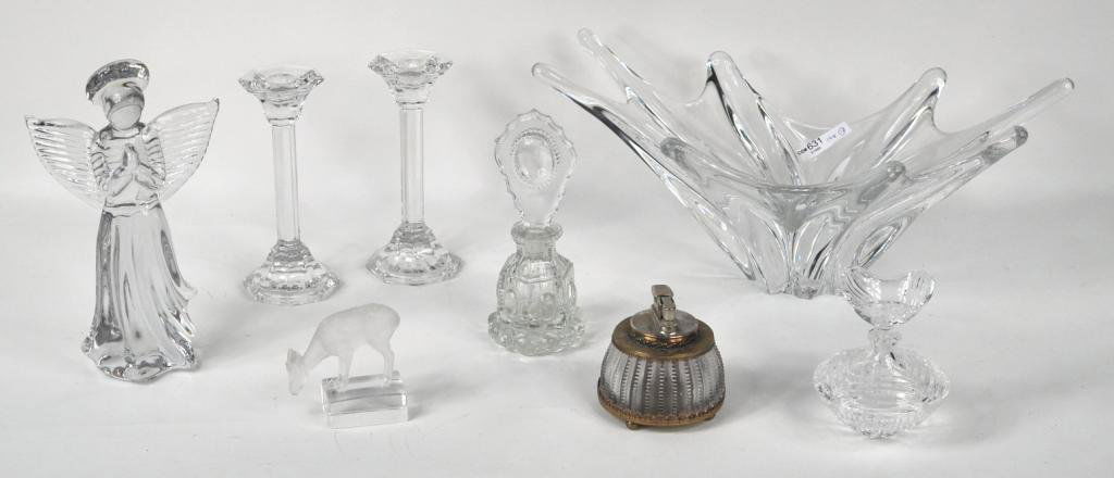 Group Assorted Glassware Items: Group of assorted glassware items, including a pair of candlesticks, an abstract dish (damage), angel figure and others as shown. Largest: 6 1/2" high, 15 1/2" wide, 7" deep; smallest: 3 1/4" high, 3"