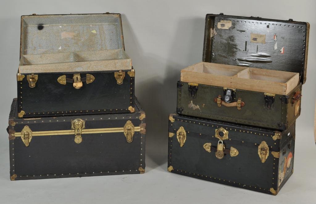 Group Four Vintage Steamer Trunks: Group of four vintage steamer trunks. Largest: 16 1/2" high, 36" wide, 20 1/4" deep; smallest: 13 1/2" high, 31" wide, 17 1/4" deep.