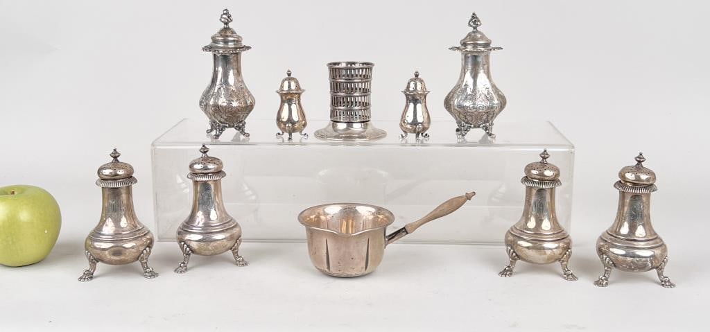 Group Sterling Silver Table Accessories: comprising eight shakers, porringer and sugar holder. Largest: 5" high, 2 1/4" diameter. Weighable silver: 23.975 OZT. Denting, oxidation, use wear, some monogrammed. *No credit card payments will be