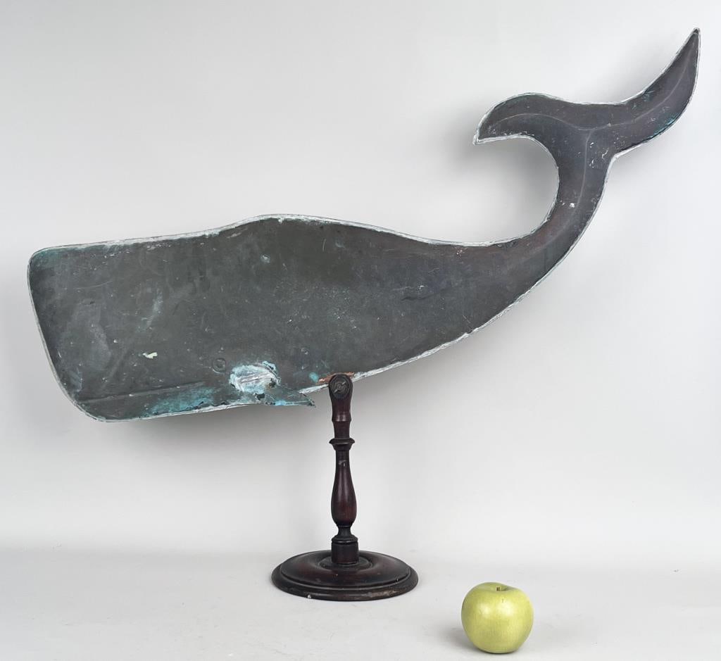 Vintage Whale Form Copper Weathervane: overall on base: 22" high, 37" wide, 7 3/8" diameter. Whale: 13 1/2" high, 37" wide, 1 1/2" deep. Denting, oxidation.