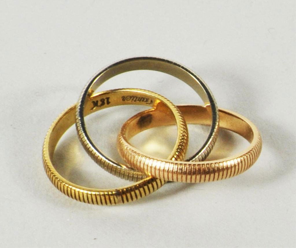 Cartier Two Colored Trinity Ring, 18K Gold: Cartier two colored Trinity ring, marked Cartier 18K, approx. size 3, approximate weight 3.5 dwt.